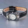 Montre en alliage de style vintage avec bracelet en cuir